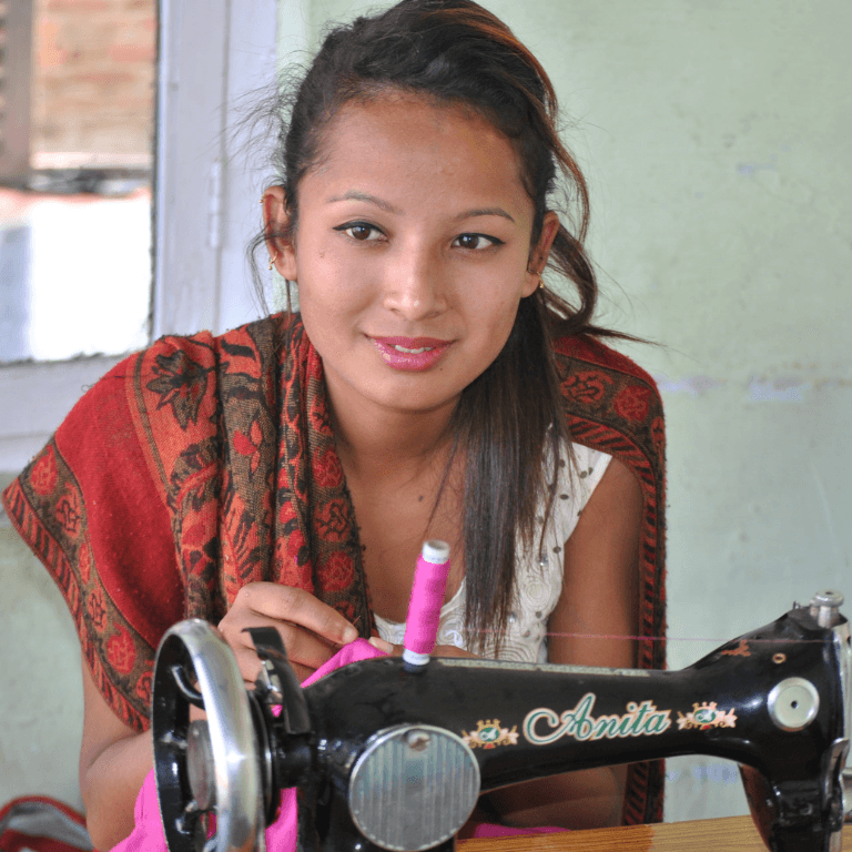 woman with sewing machine