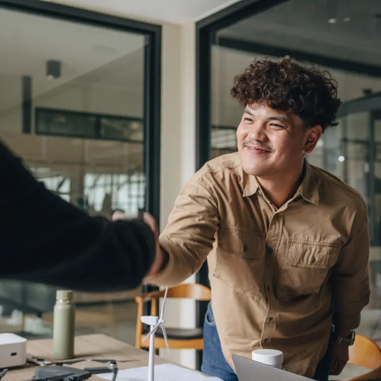 Person shaking a hand