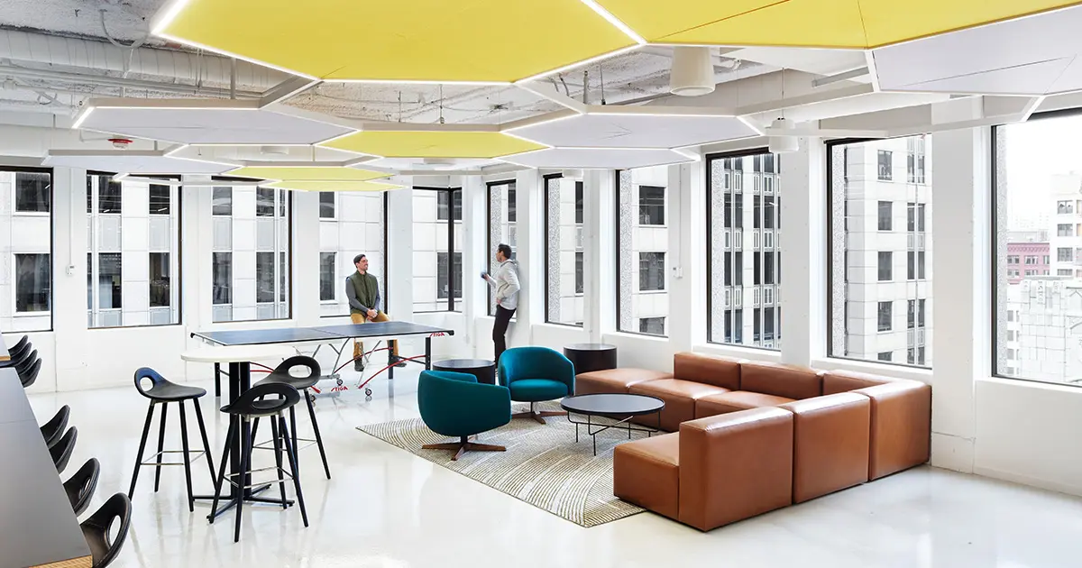 two people chatting in the west monroe office