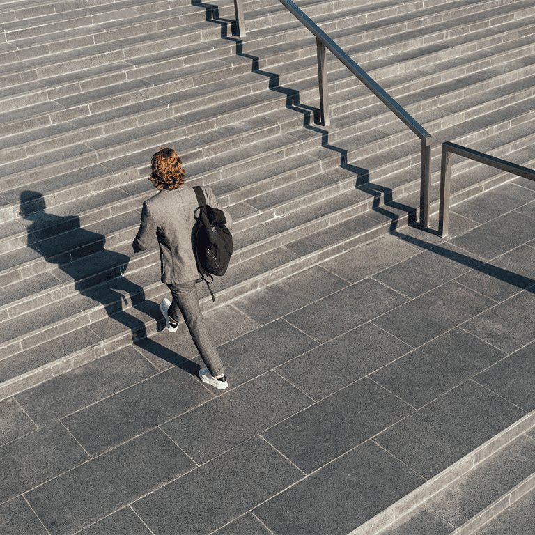 Woman walking up stairs