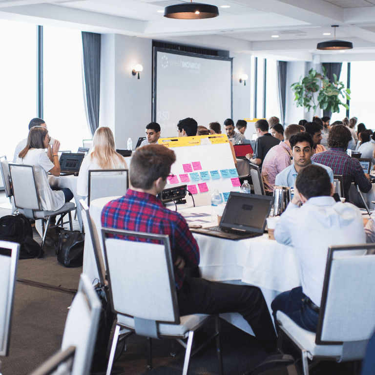 conference room with people working on presentations