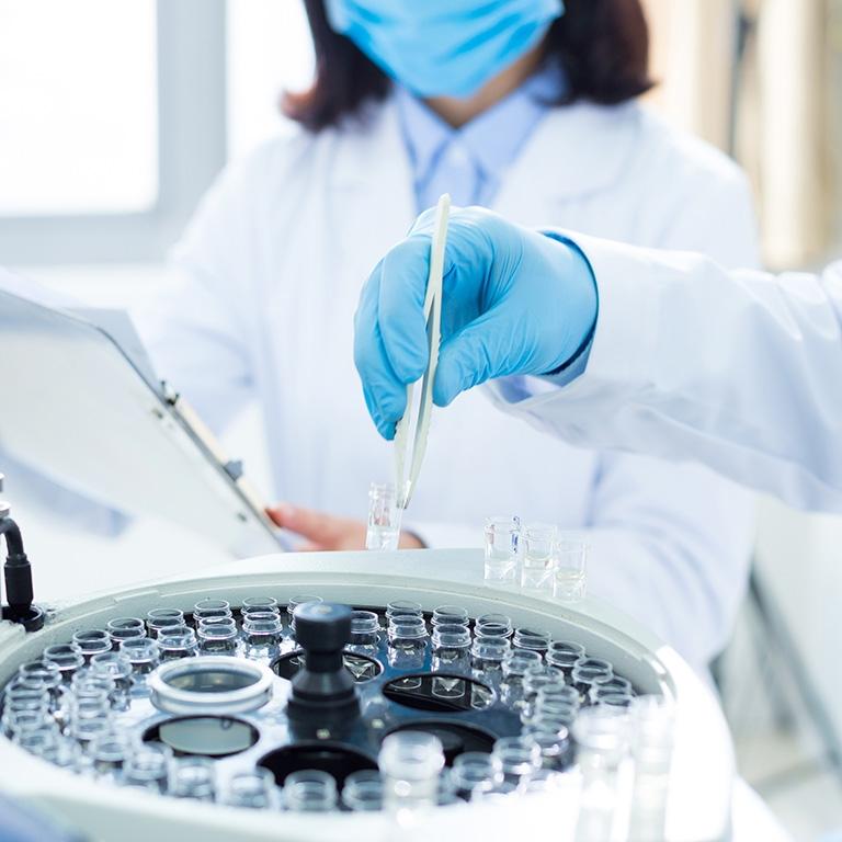 close up view of laboratory scientists conducting experiments
