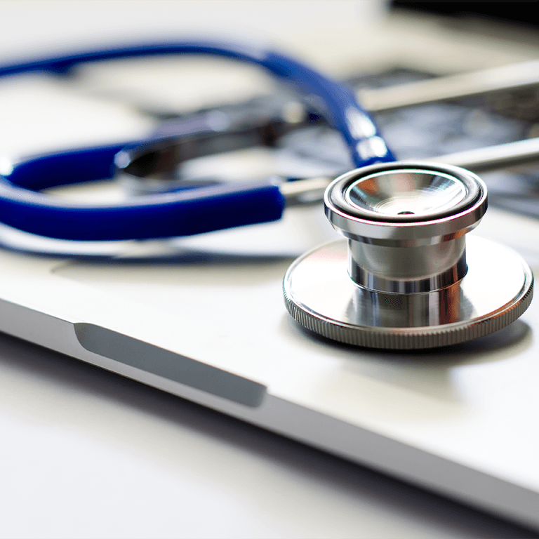 stethoscope on a laptop