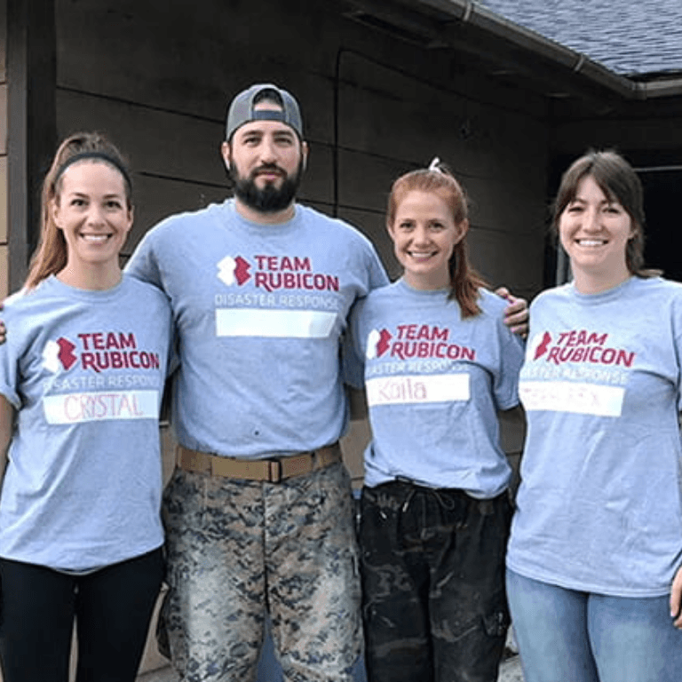 Group of people wearing "Team Rubicon" shirts