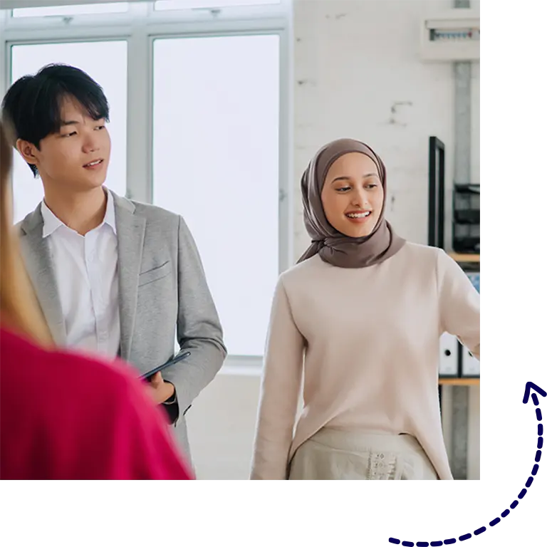 Man and woman standing in an office setting