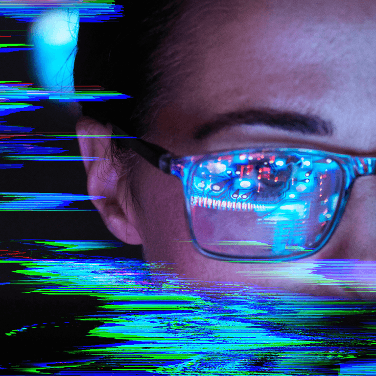 woman with glasses, abstract image reflected in lens