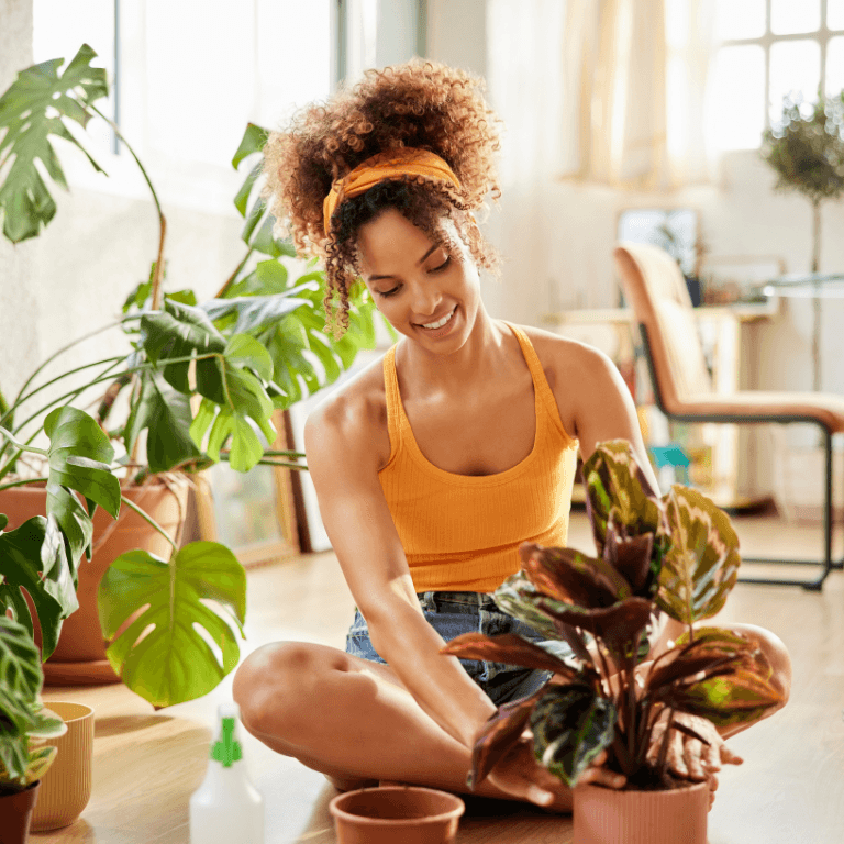 Woman planting a plant