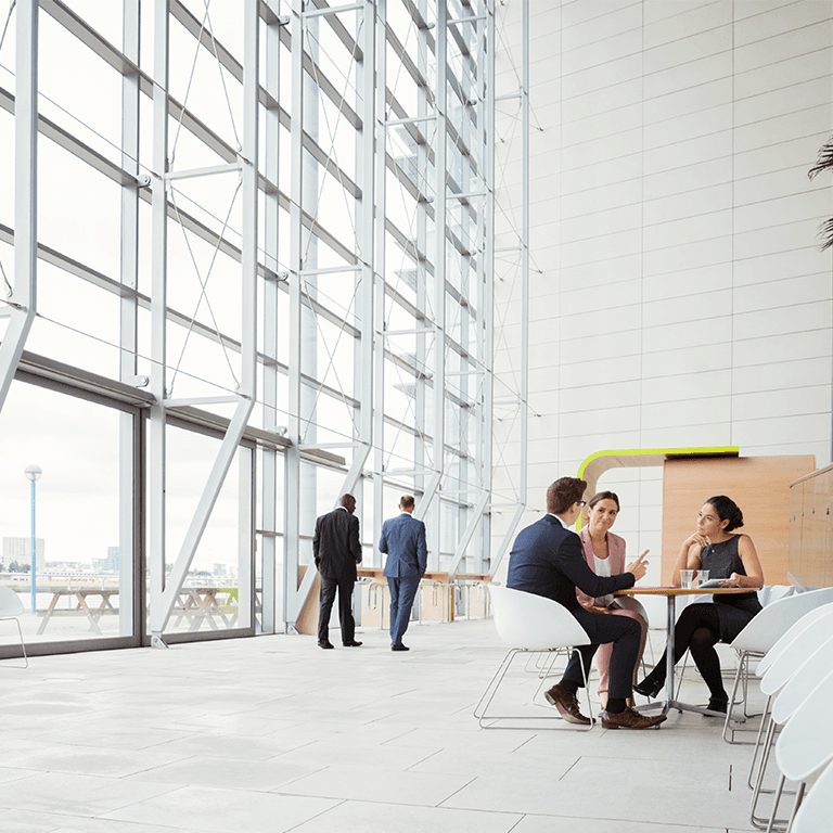 People meeting in a open office foyer