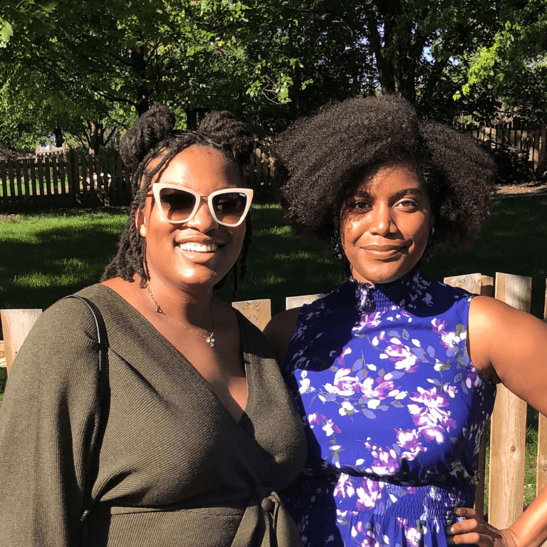 Two women smiling